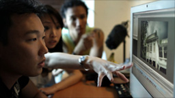 Film crew in
                    editing suite - Andrew, Sheena, Farid