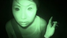 Sheena looking
                    into the helmet mounted infrared camera